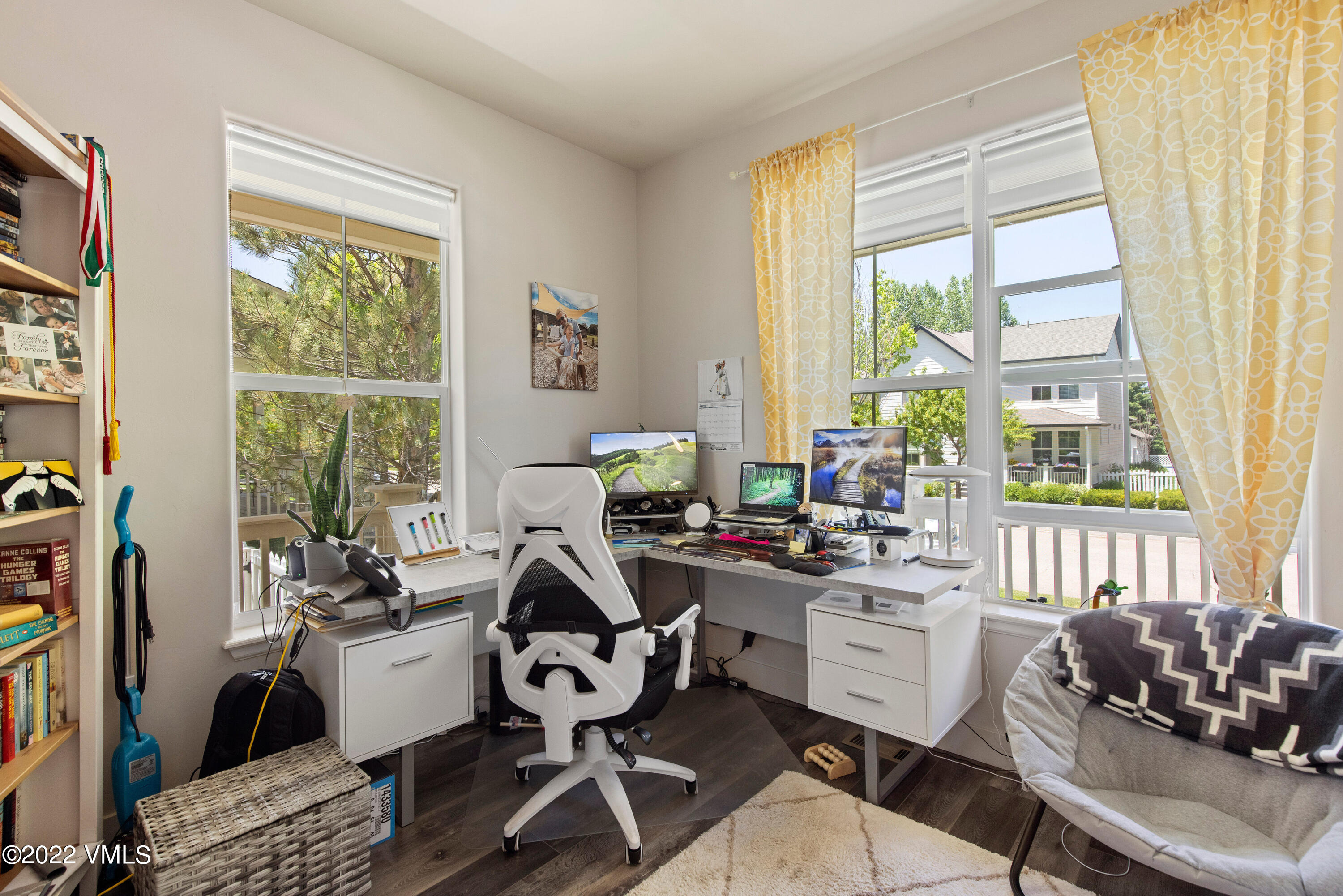 40 Eagle Ranch Road Eagle, CO 81631 - Photo 17 of 38 a view of a dining room with furniture a couch and wooden floor