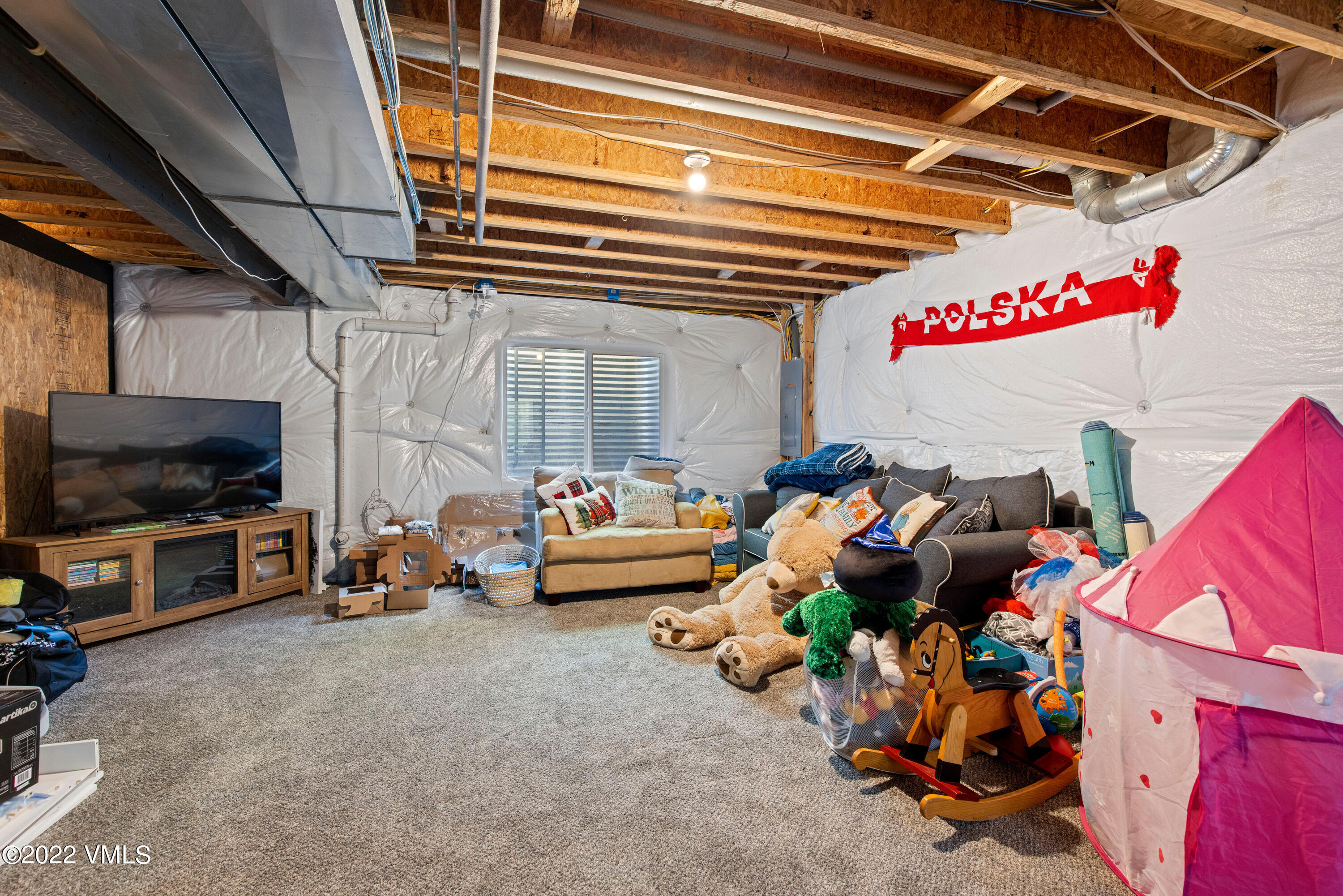 40 Eagle Ranch Road Eagle, CO 81631 - Photo 29 of 38 a view of a garage with a couch