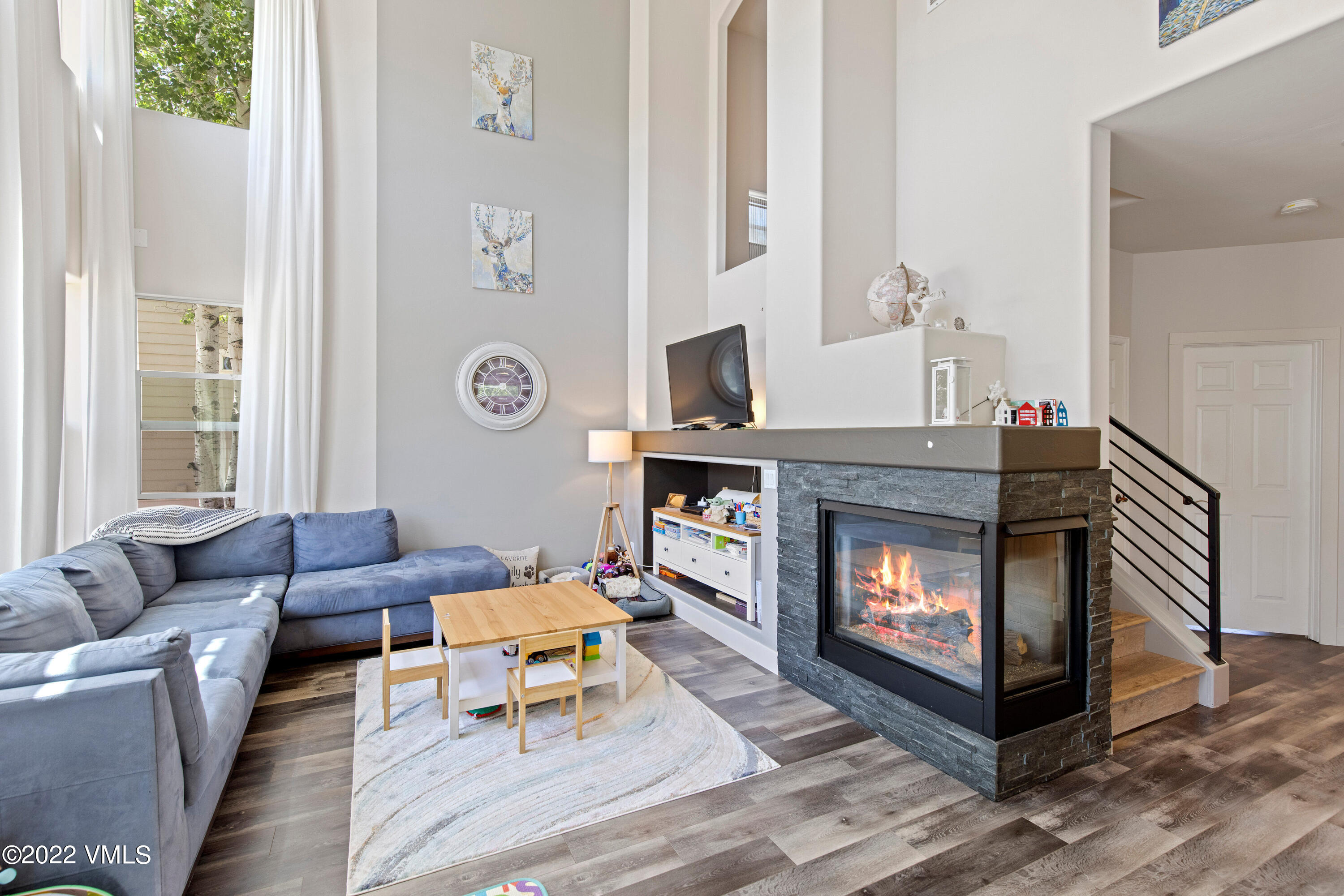 40 Eagle Ranch Road Eagle, CO 81631 - Photo 4 of 38 a living room with furniture and a fireplace