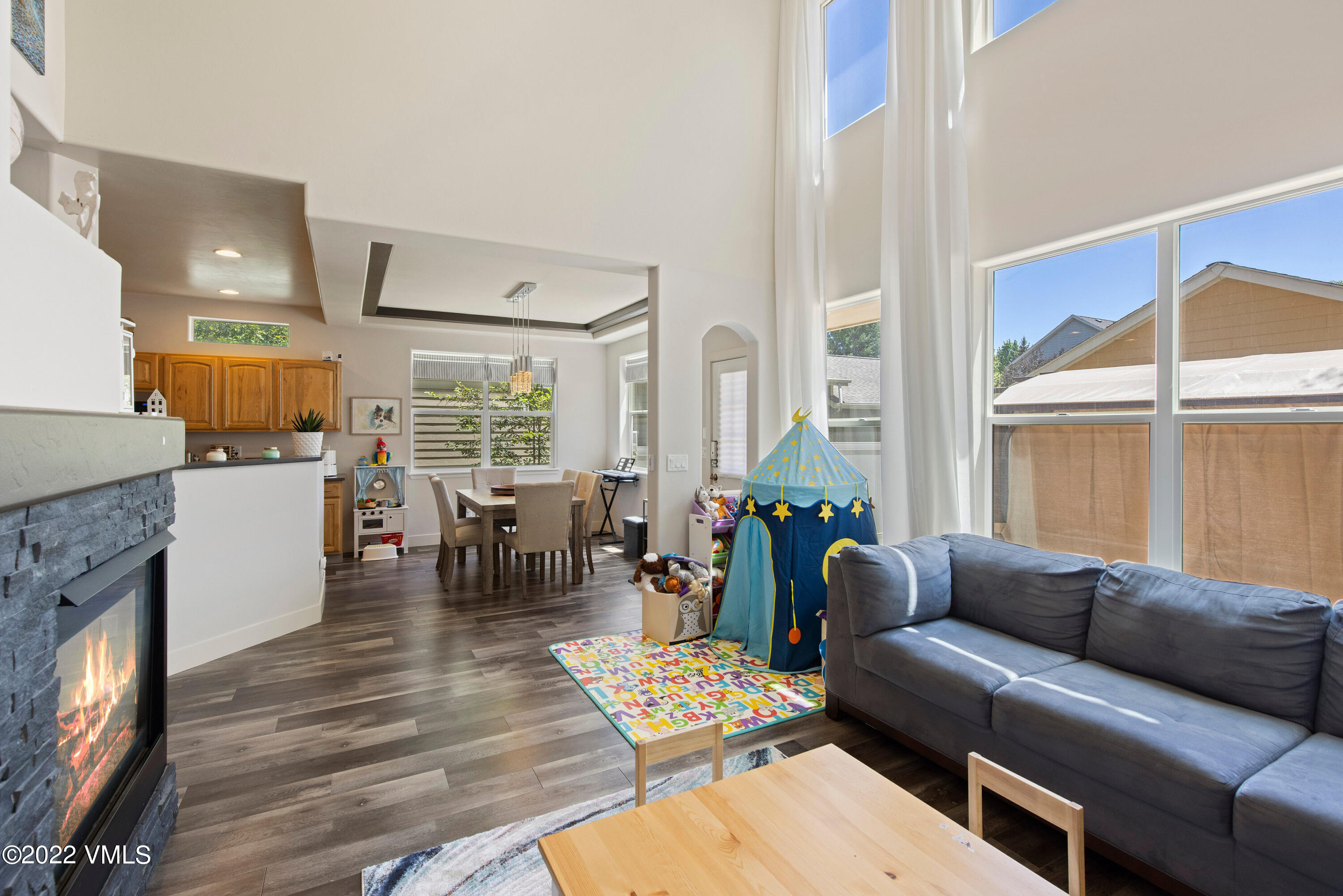 40 Eagle Ranch Road Eagle, CO 81631 - Photo 5 of 38 a living room with furniture and a fireplace