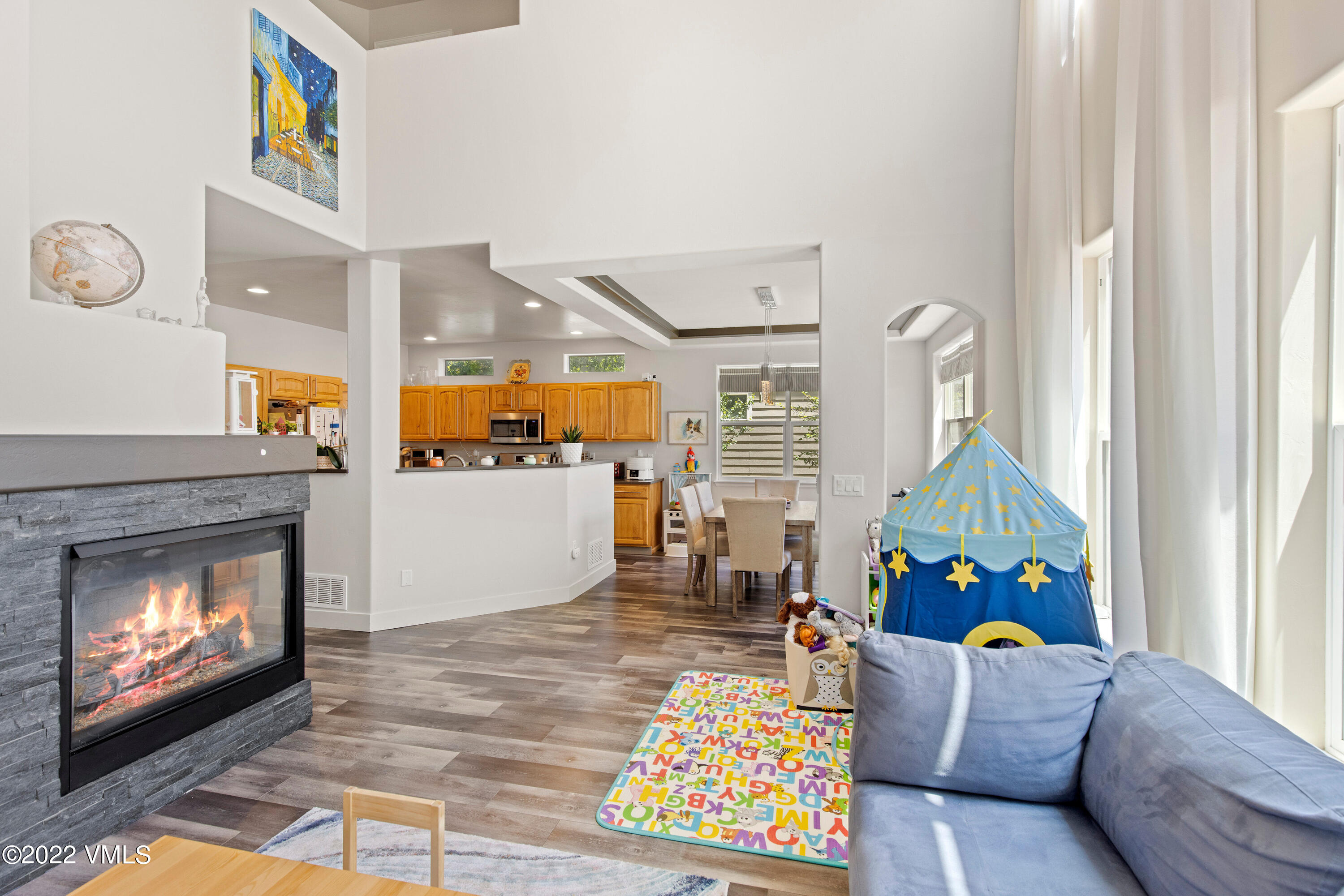 40 Eagle Ranch Road Eagle, CO 81631 - Photo 6 of 38 a living room with furniture and a fireplace