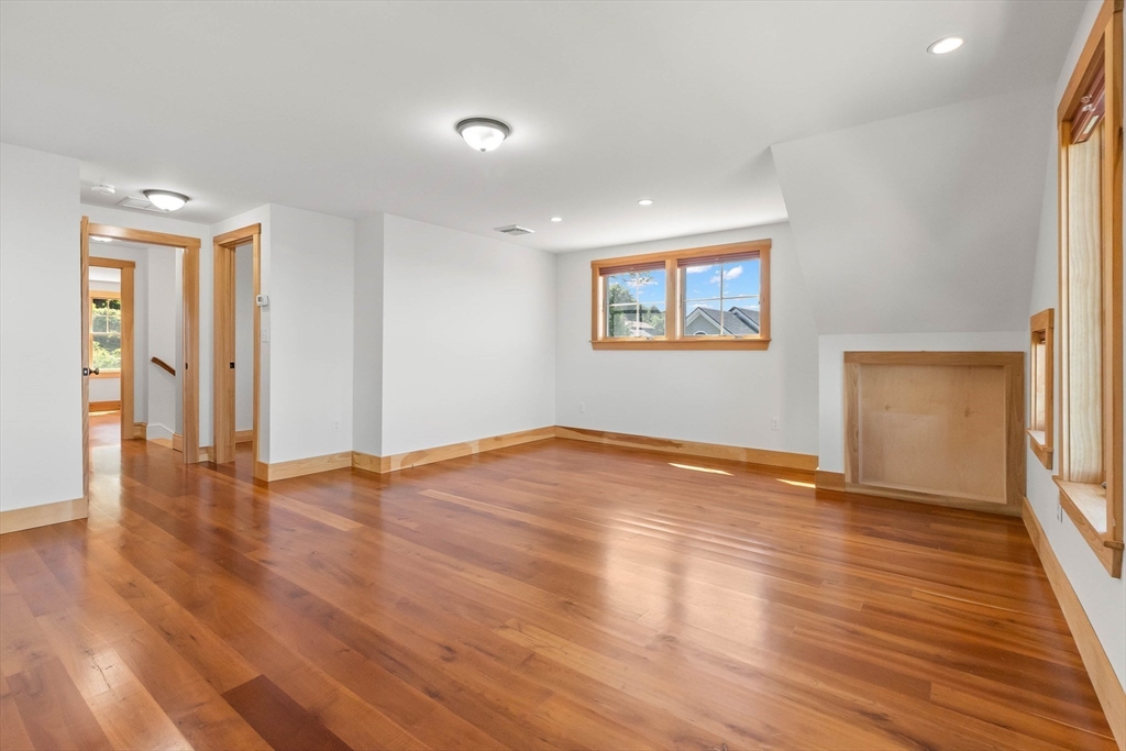 1 Jay Road Ipswich, MA 01938 - Photo 37 of 41 an empty room with wooden floor and windows