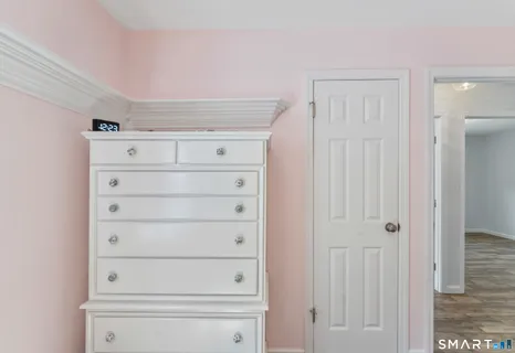 a room with window and wooden floor