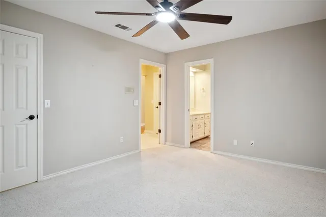 a bathroom with a bathtub and toilet