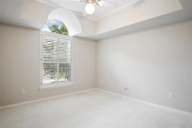 a bathroom with a sink vanity mirror and toilet