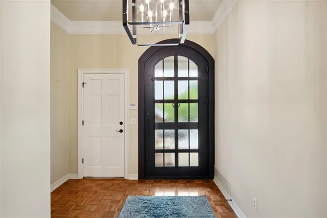 a large bathroom with a large mirror and a sink