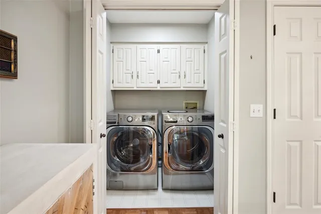 a view of an empty room with a fireplace