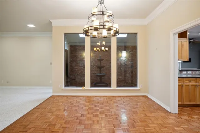 a view of an empty room with a fireplace