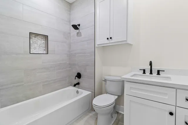 a view of a hallway with cabinet