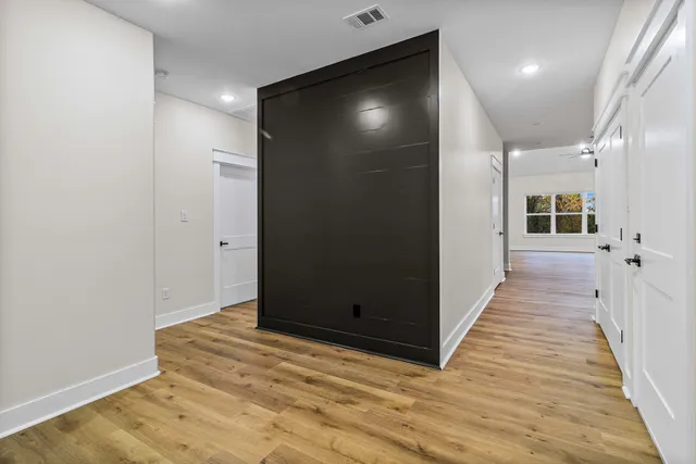 a view of kitchen with wooden floor