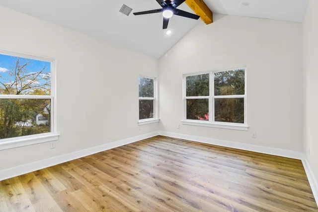 a bathroom with a granite countertop sink mirror and vanity