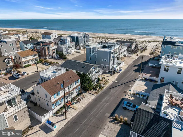a view of a street with a building in the background