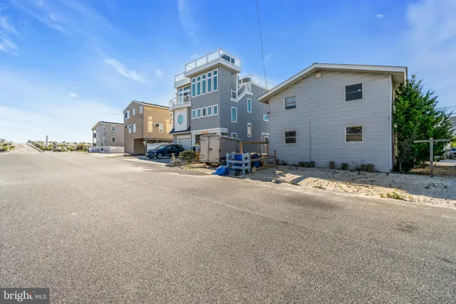 a view of a kitchen with furniture and a window