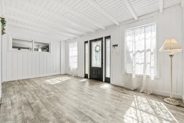 an empty room with windows