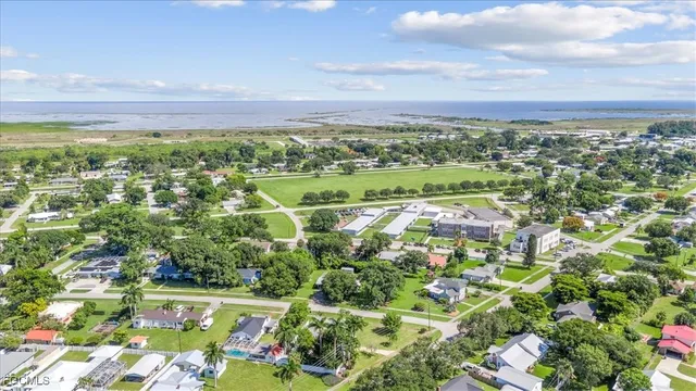 a view of city with ocean