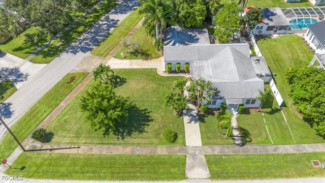 an aerial view of a house with a garden