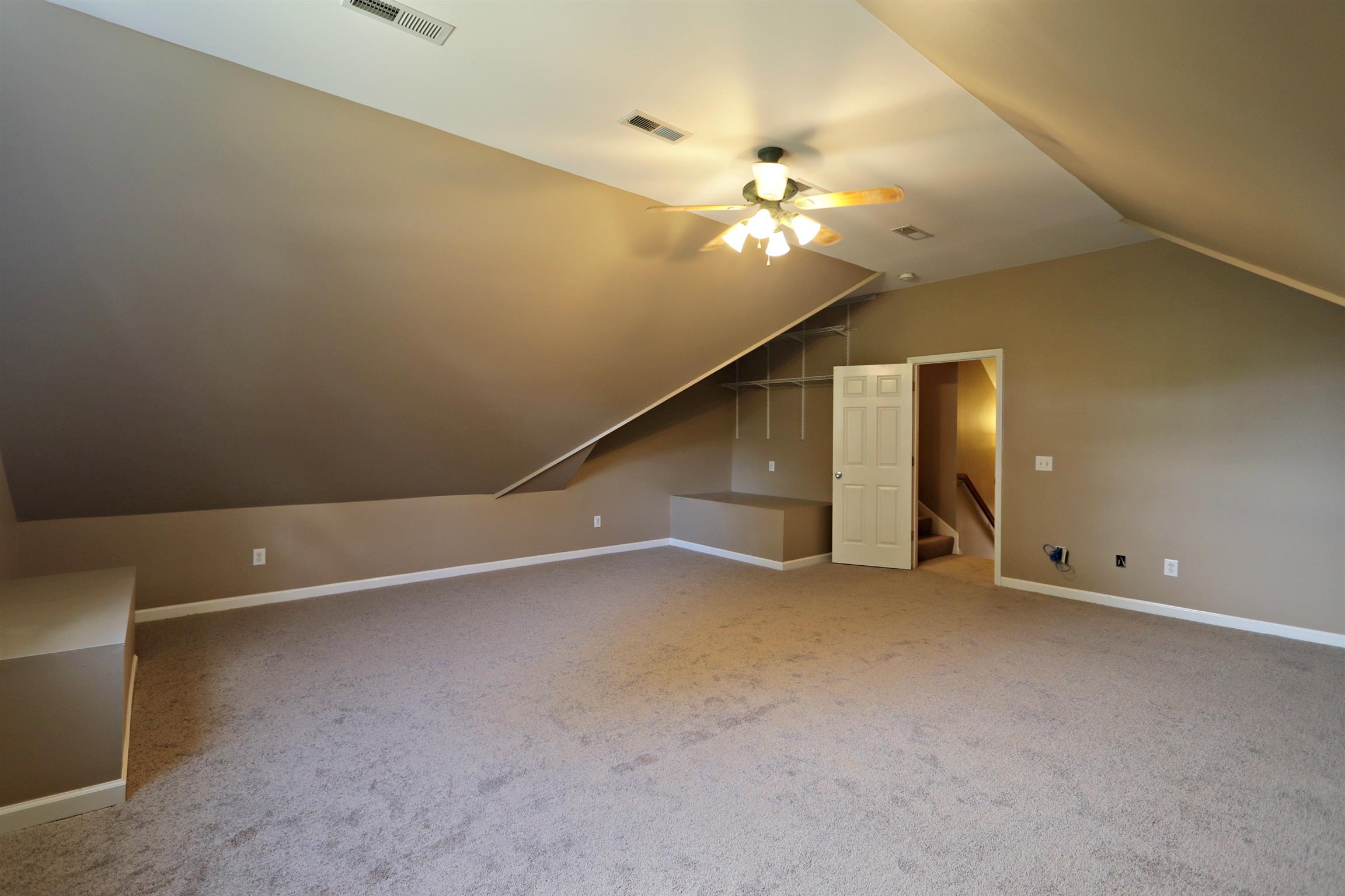 833 Rands Way Columbia, TN 38401 - Photo 22 of 27 an empty room with fan and windows