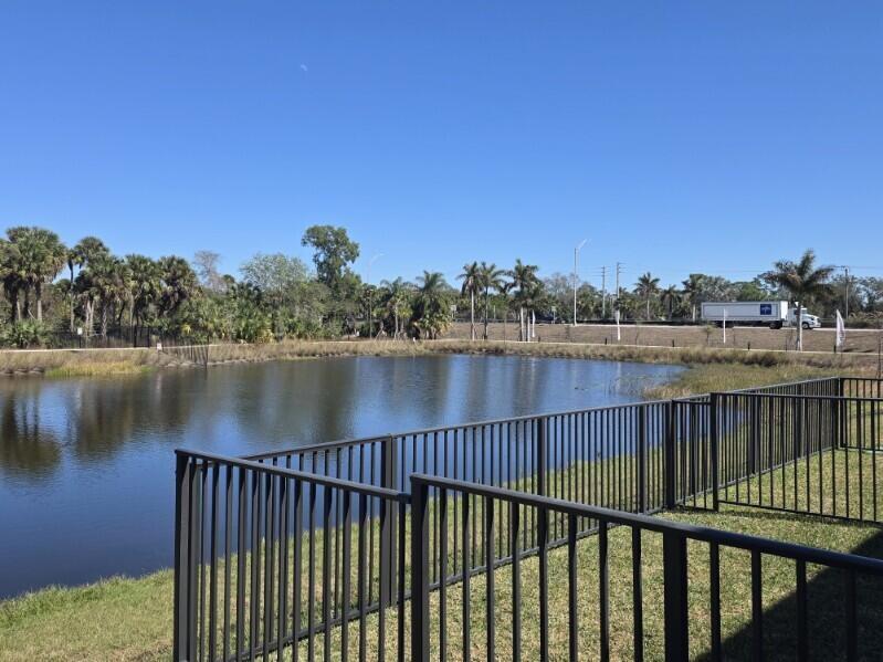 7783 Southwest Bentley Lane Stuart, FL 34997 - Photo 27 of 34 a view of lake from a balcony