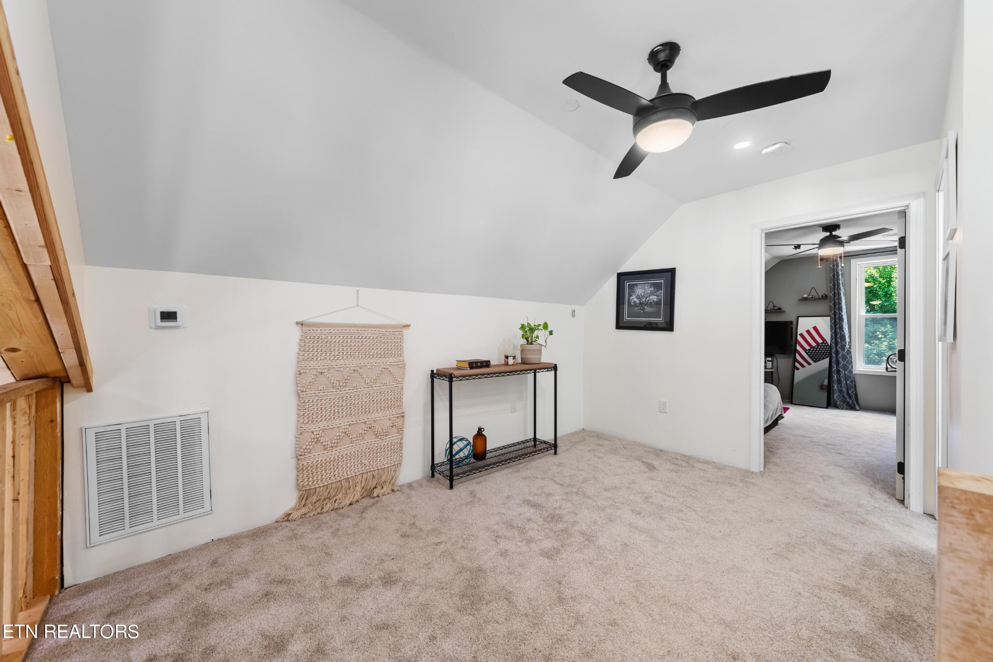 157 Foust Hollow Road Heiskell, TN 37754 - Photo 20 of 34 en empty room with ceiling fan and windows