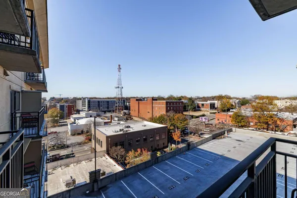 a view of a roof deck with sitting area