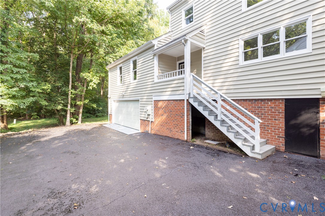 12532 Eagle Ridge Road Henrico, VA 23233 - Photo 58 of 68 Siding exterior with multiple windows, brick found