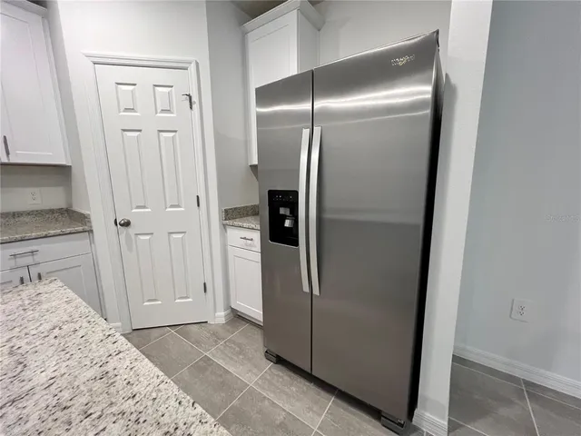 a view of bathroom with hallway