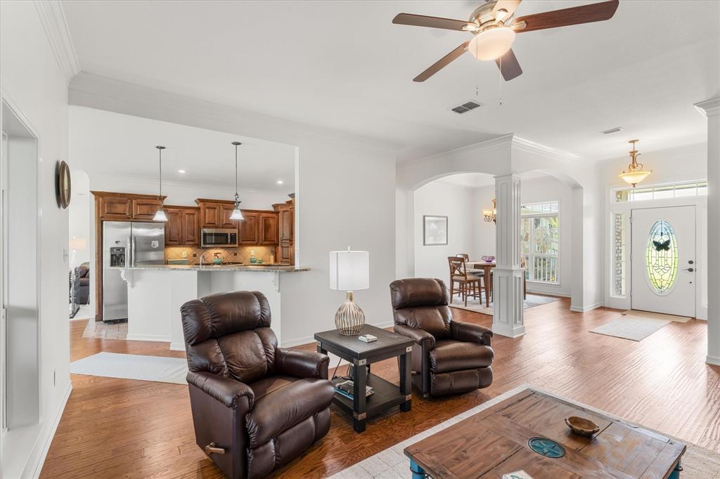 345 Rains County Road 3390 Emory, TX 75440 - Photo 10 of 39 a living room with furniture and kitchen view