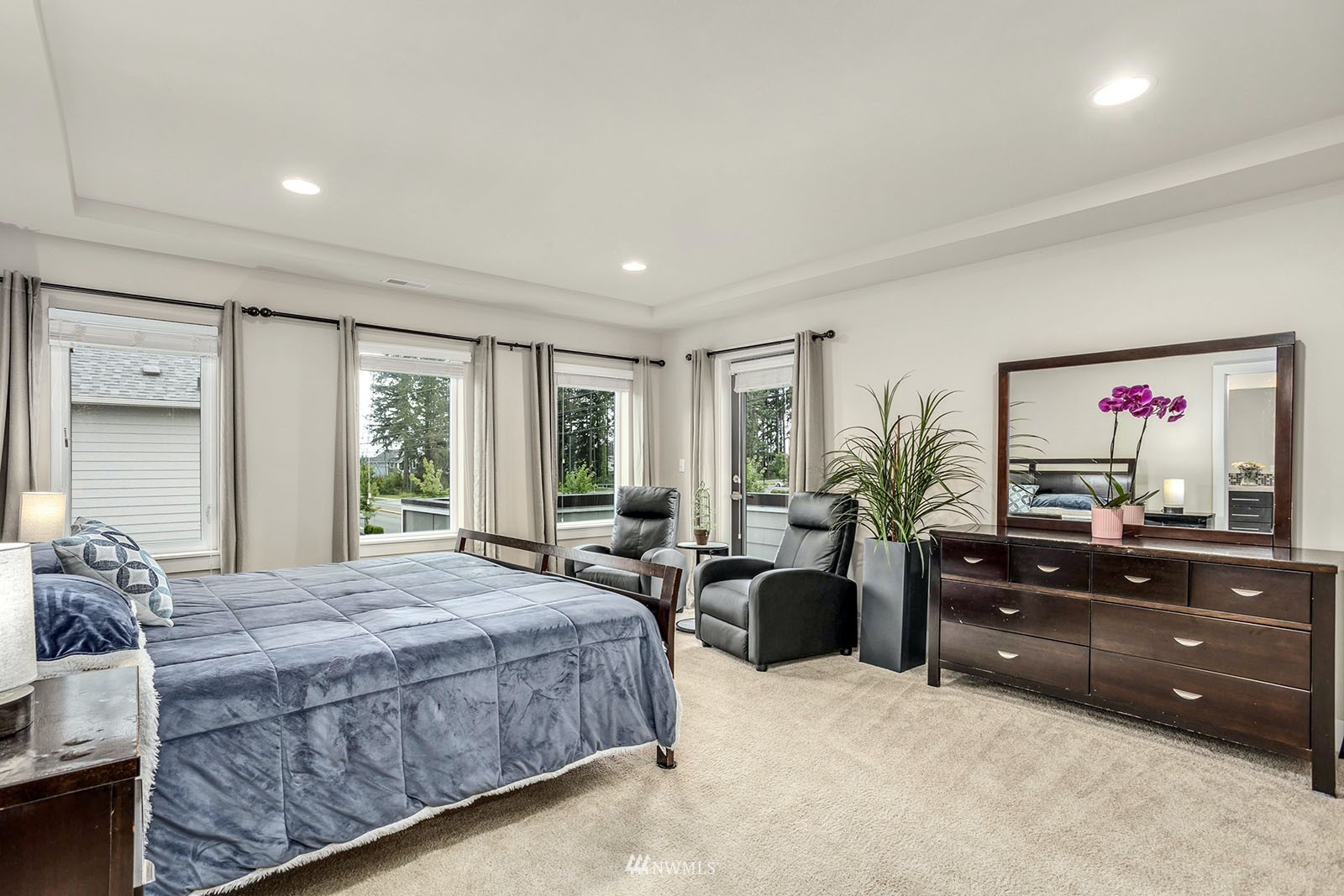 18005 44th Avenue Southeast Bothell, WA 98012 - Photo 15 of 30 a bedroom with a bed and a dresser