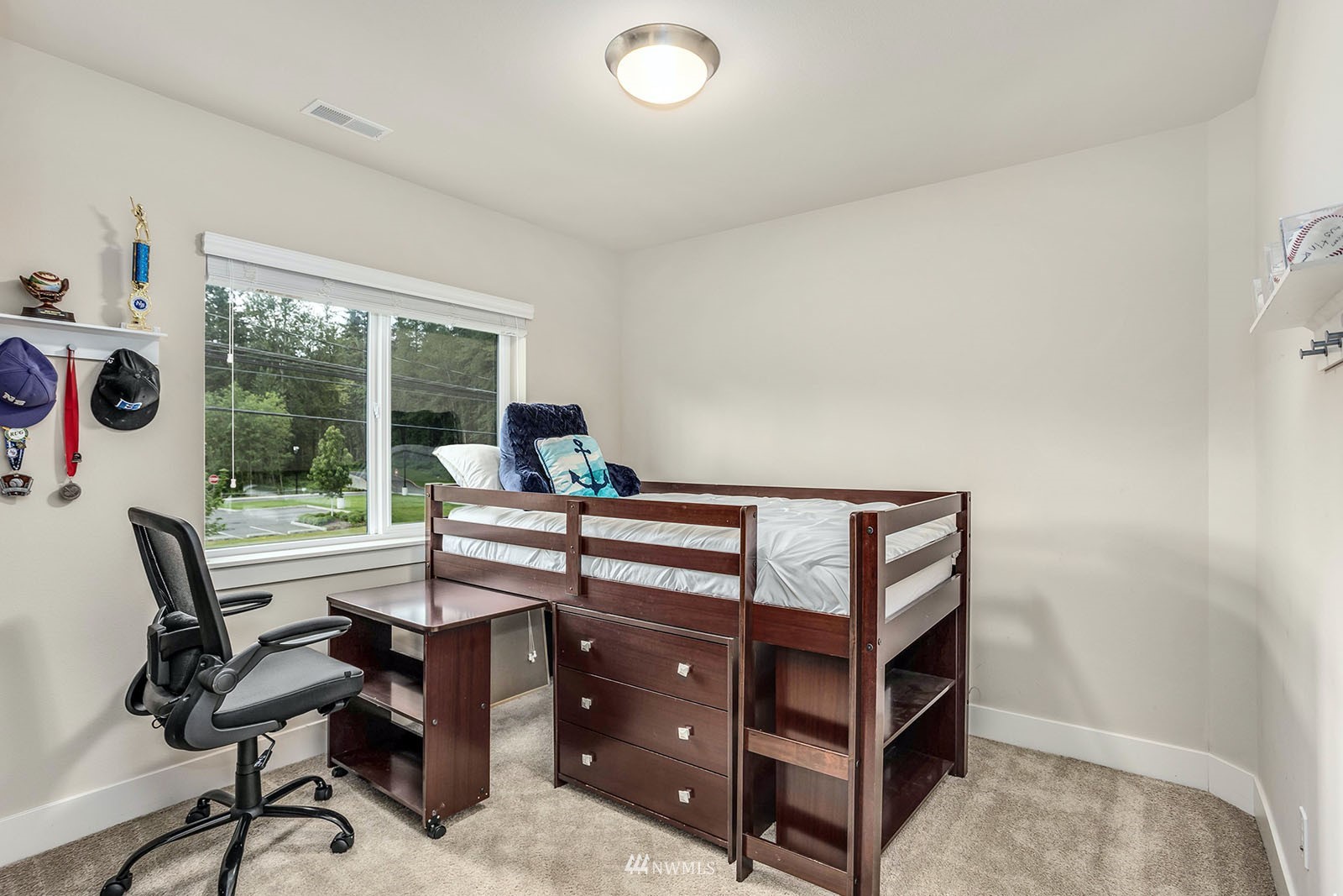 18005 44th Avenue Southeast Bothell, WA 98012 - Photo 22 of 30 a view of a workspace with furniture and a window