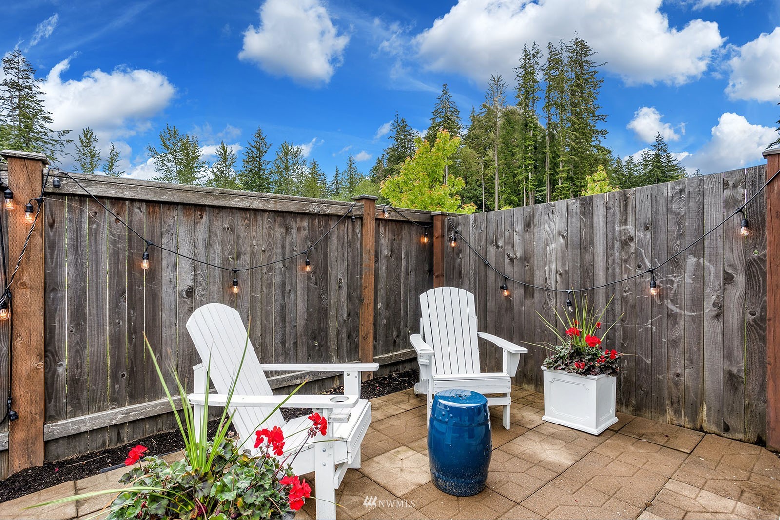 18005 44th Avenue Southeast Bothell, WA 98012 - Photo 3 of 30 a front view of a house with patio