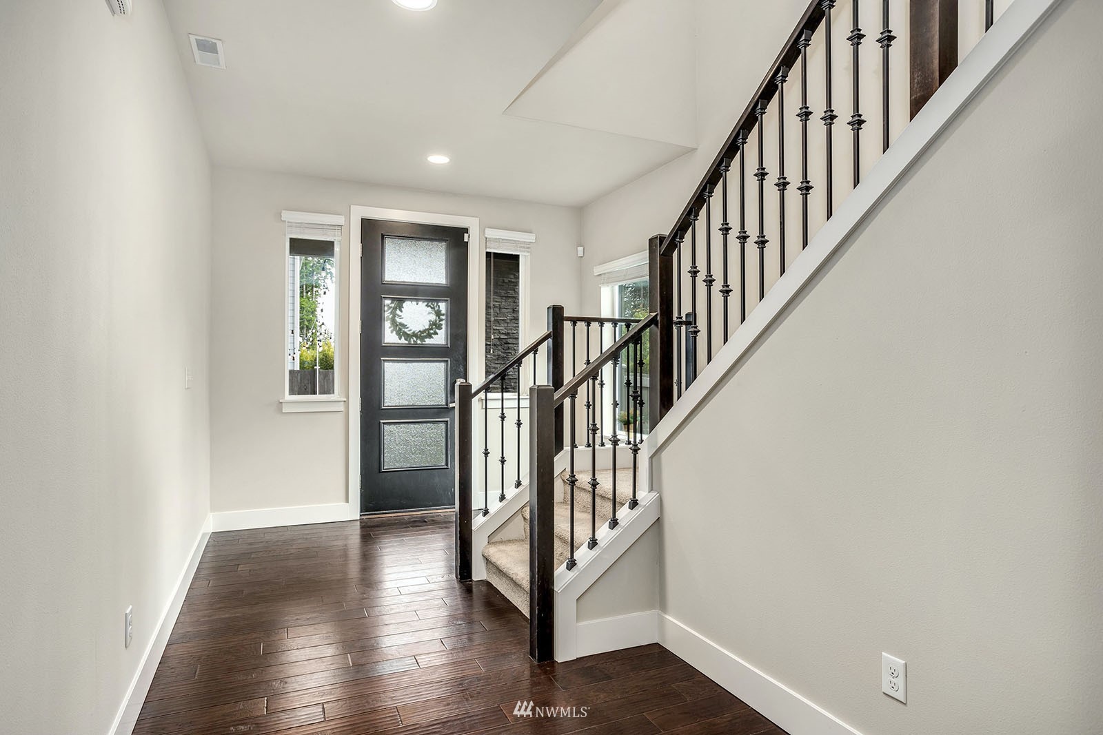 18005 44th Avenue Southeast Bothell, WA 98012 - Photo 4 of 30 a view of entryway with wooden floor