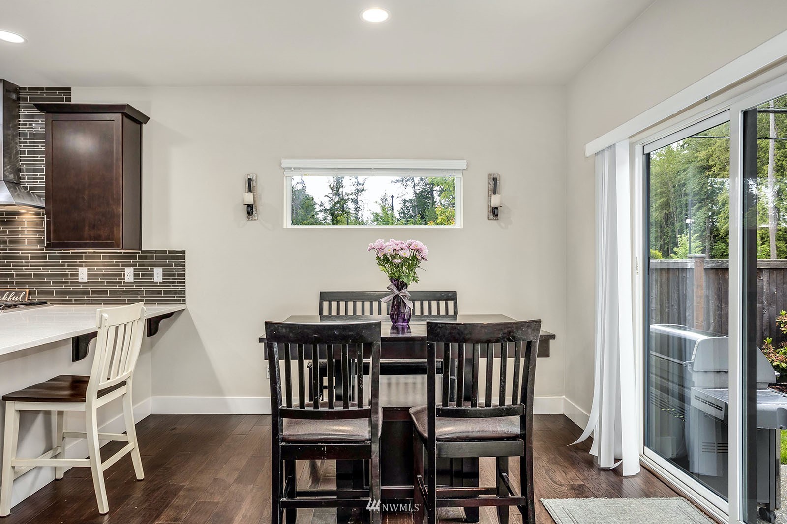 18005 44th Avenue Southeast Bothell, WA 98012 - Photo 10 of 30 a view of a dining room with furniture window and outside view