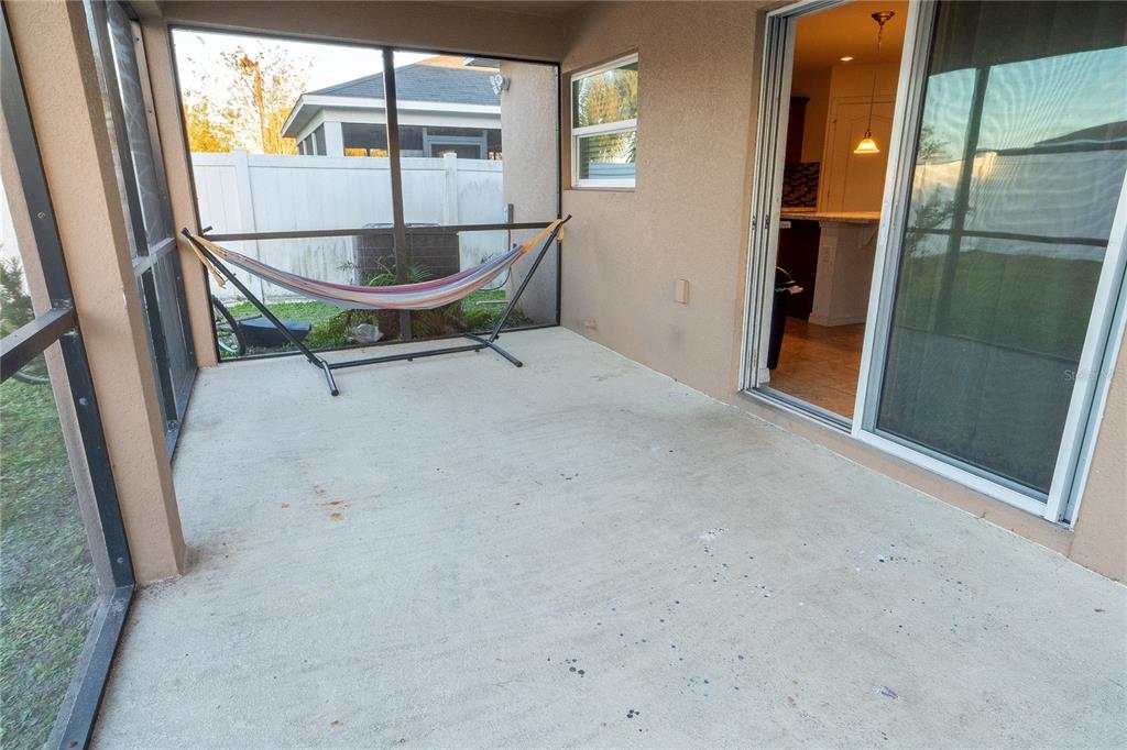 4563 Orchard Grove Road St. Cloud, FL 34772 - Photo 45 of 51 a view of a room with a sink and glass door