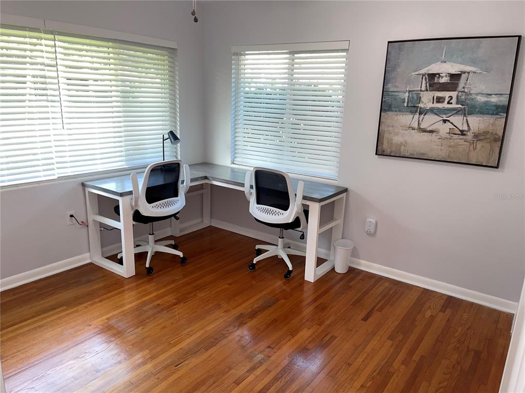 1963 Ripon Drive Clearwater, FL 33764 - Photo 19 of 29 a view of a workspace with furniture and a window