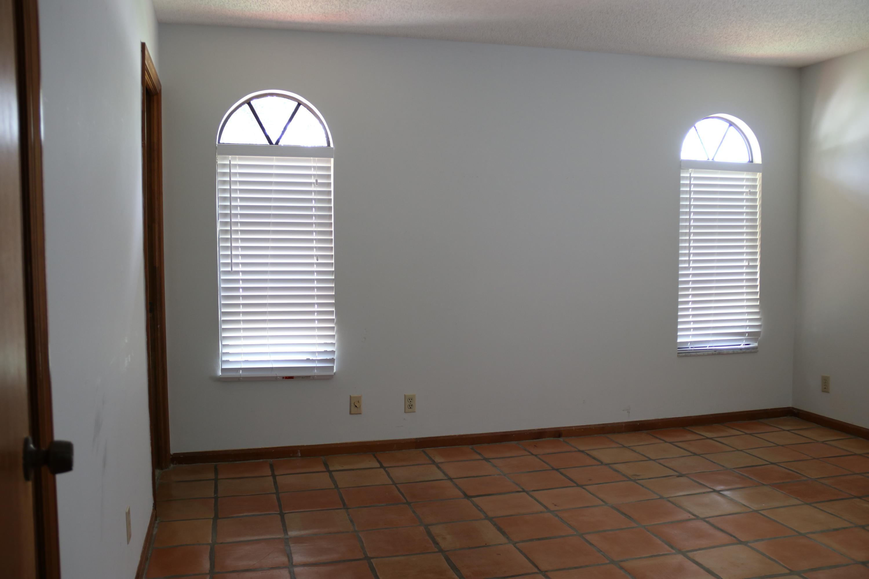 6098 Kendrick Street Jupiter, FL 33458 - Photo 11 of 15 an empty room with windows
