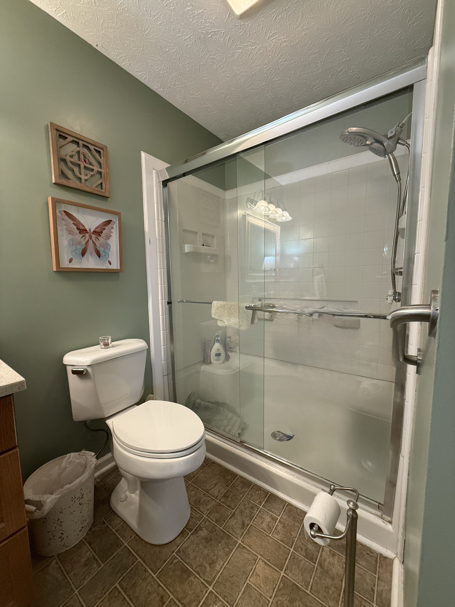 2115 Mockingbird Lane, Unit A Springfield, TN 37172 - Photo 12 of 12 a bathroom with a toilet and a shower