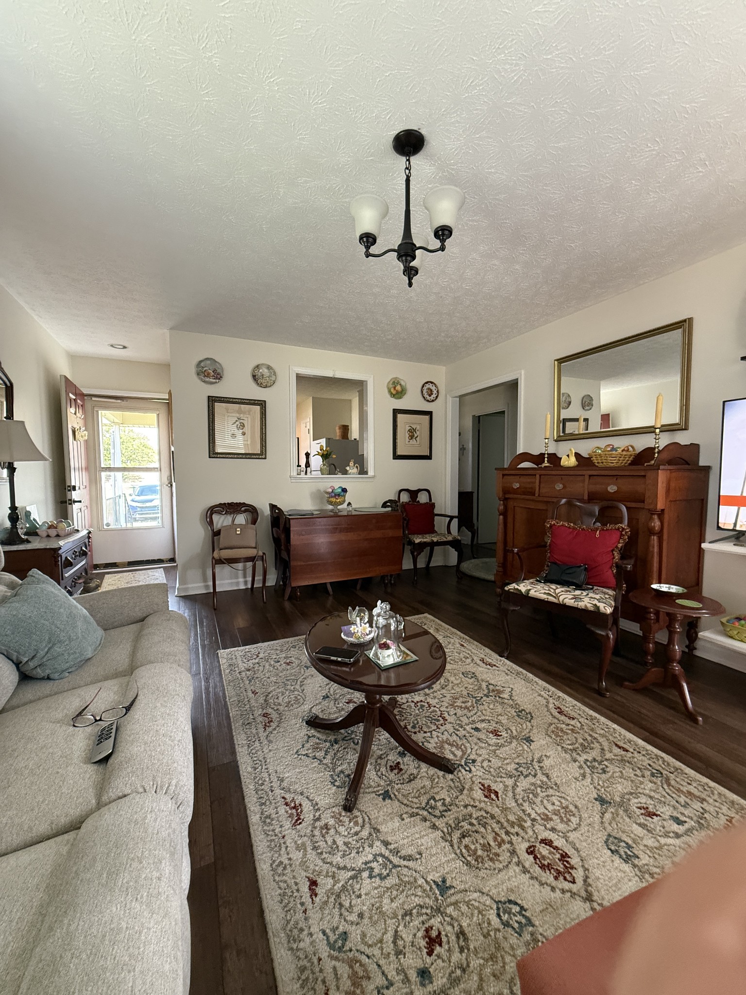 2115 Mockingbird Lane, Unit A Springfield, TN 37172 - Photo 5 of 12 a living room with furniture a rug and a fireplace