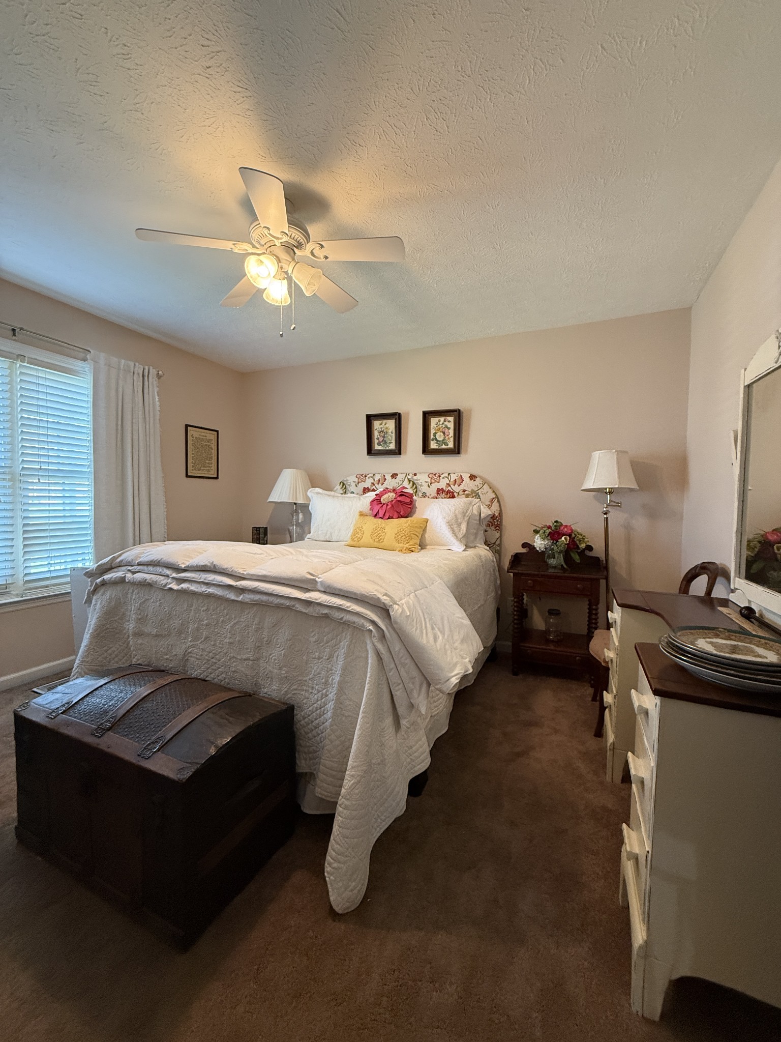 2115 Mockingbird Lane, Unit A Springfield, TN 37172 - Photo 6 of 12 a bedroom with bed and a chandelier