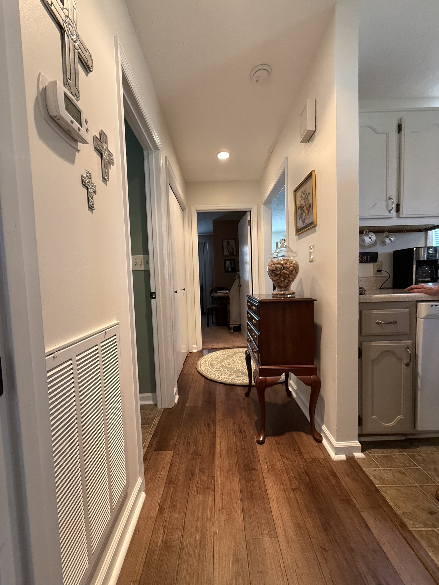 2115 Mockingbird Lane, Unit A Springfield, TN 37172 - Photo 7 of 12 a view of a hallway with wooden floor and furniture