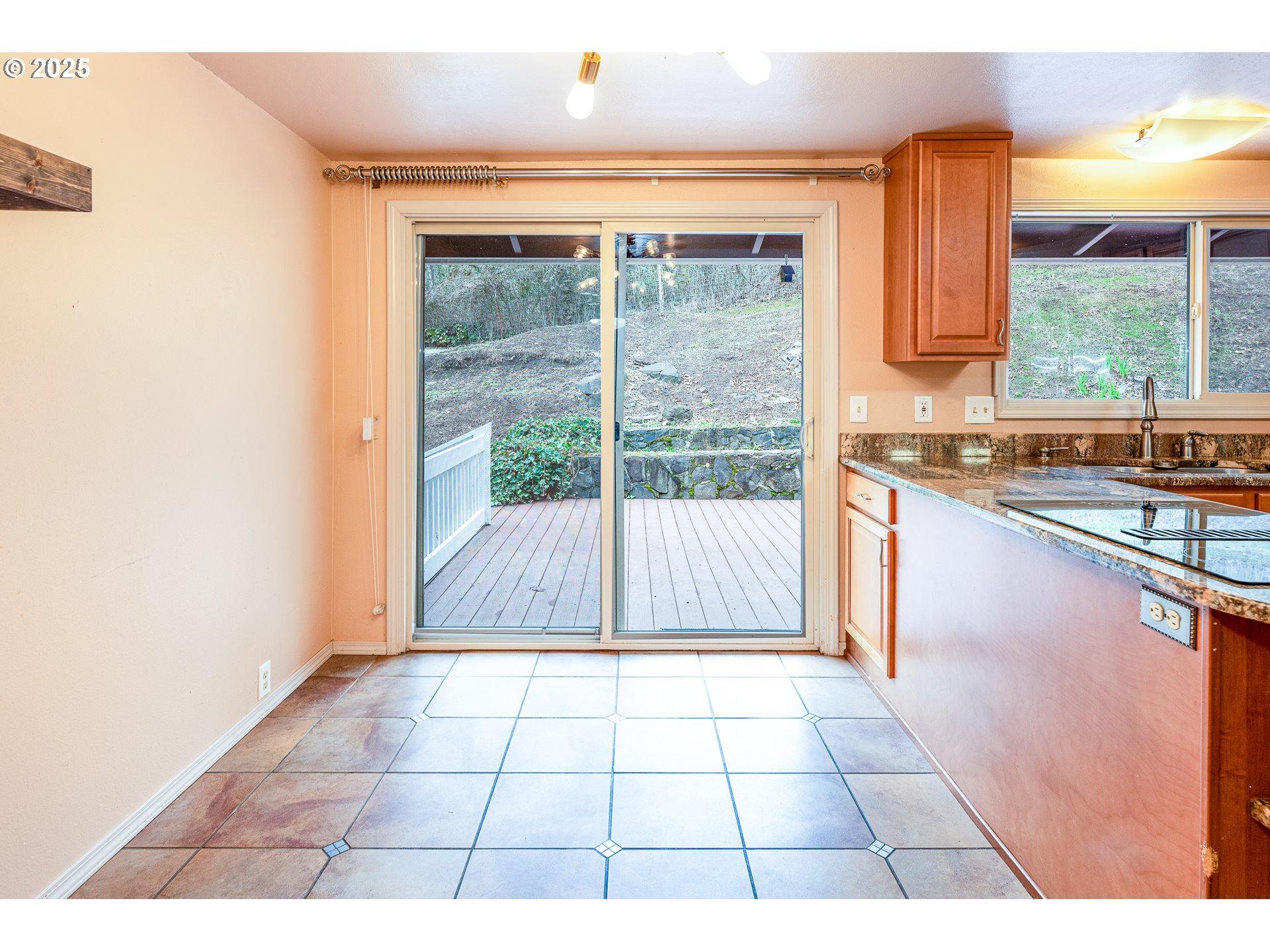 293 Brae Burn Drive Eugene, OR 97405 - Photo 14 of 35 a view of a kitchen with a sink and cabinets