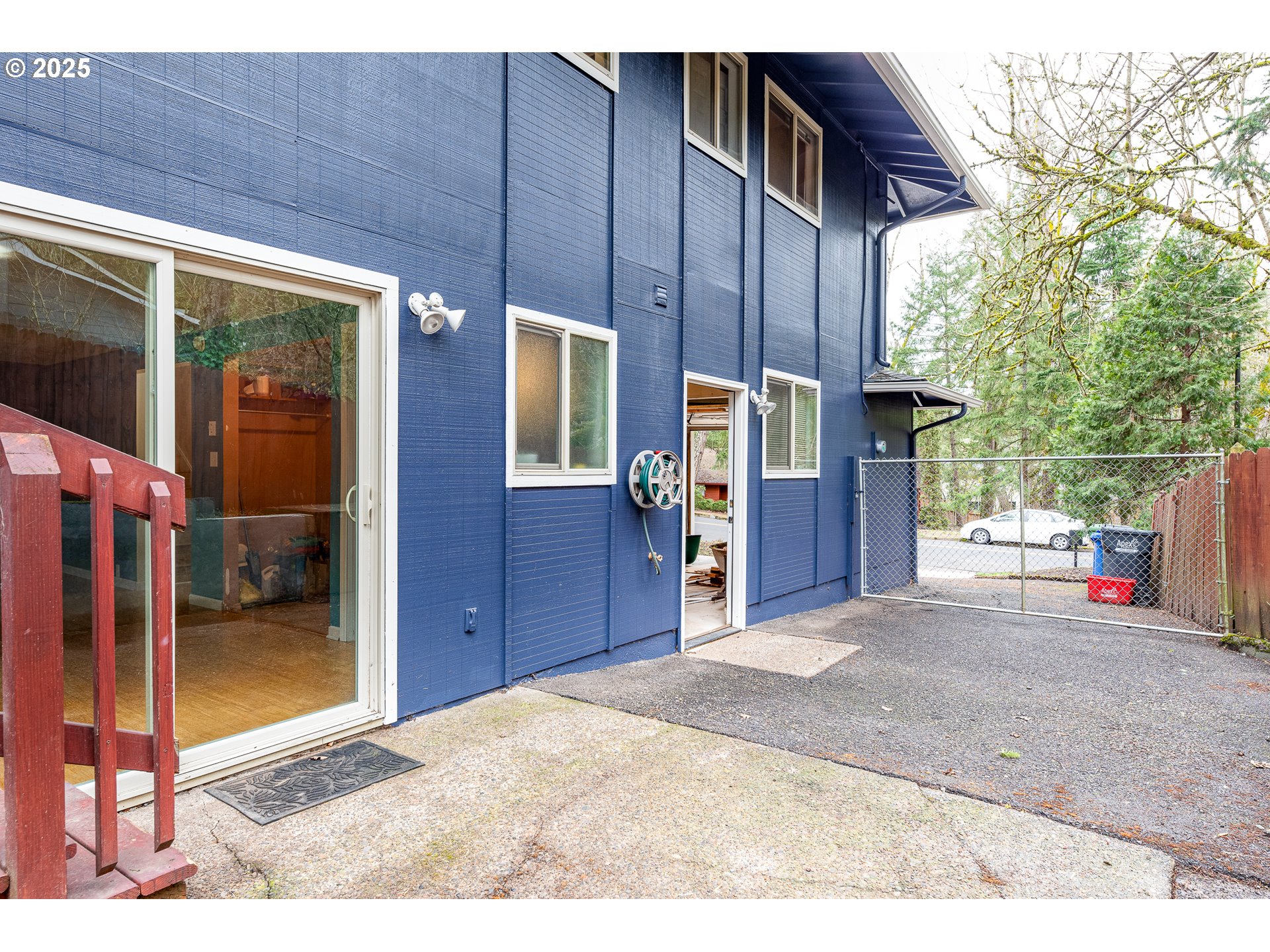 293 Brae Burn Drive Eugene, OR 97405 - Photo 34 of 35 a view of a house with entryway and wooden fence