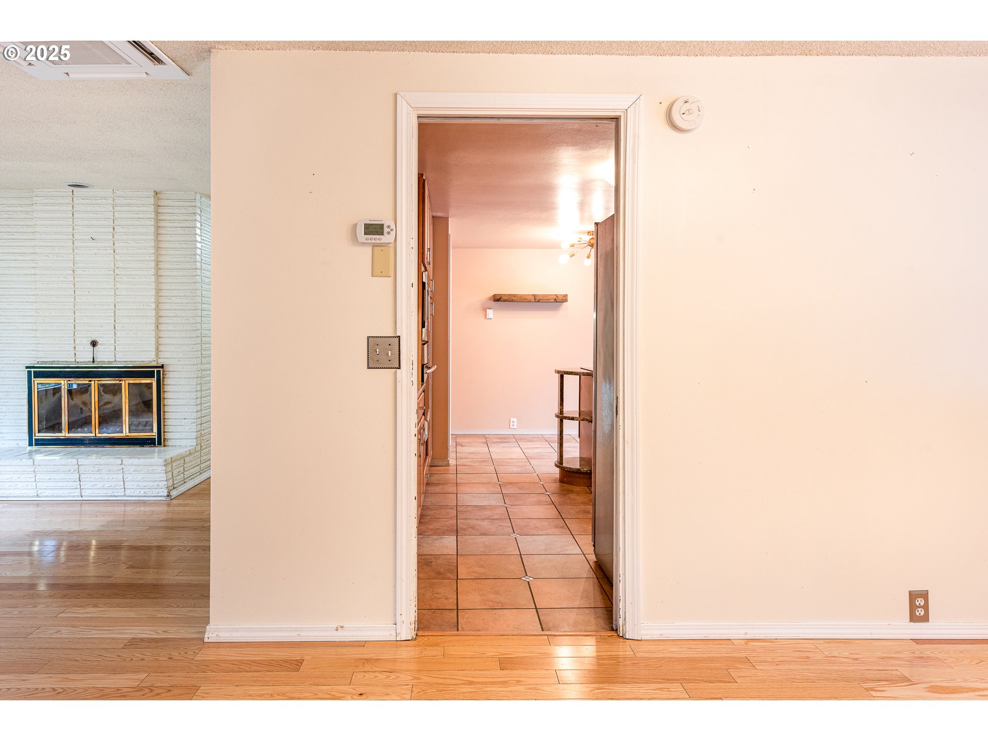 293 Brae Burn Drive Eugene, OR 97405 - Photo 8 of 35 a view of a living room with a wooden floor