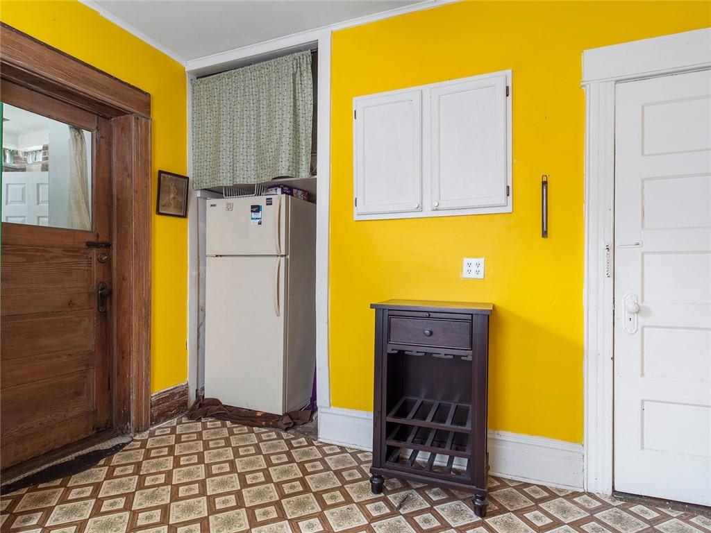 446 76th Street Brooklyn, NY 11209 - Photo 12 of 35 a view of a door and chair