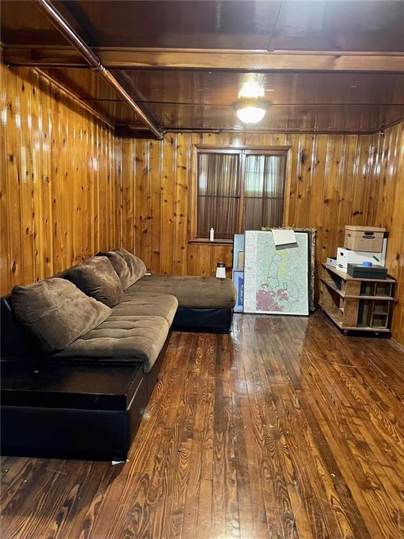 446 76th Street Brooklyn, NY 11209 - Photo 27 of 35 a living room with a couch and a table
