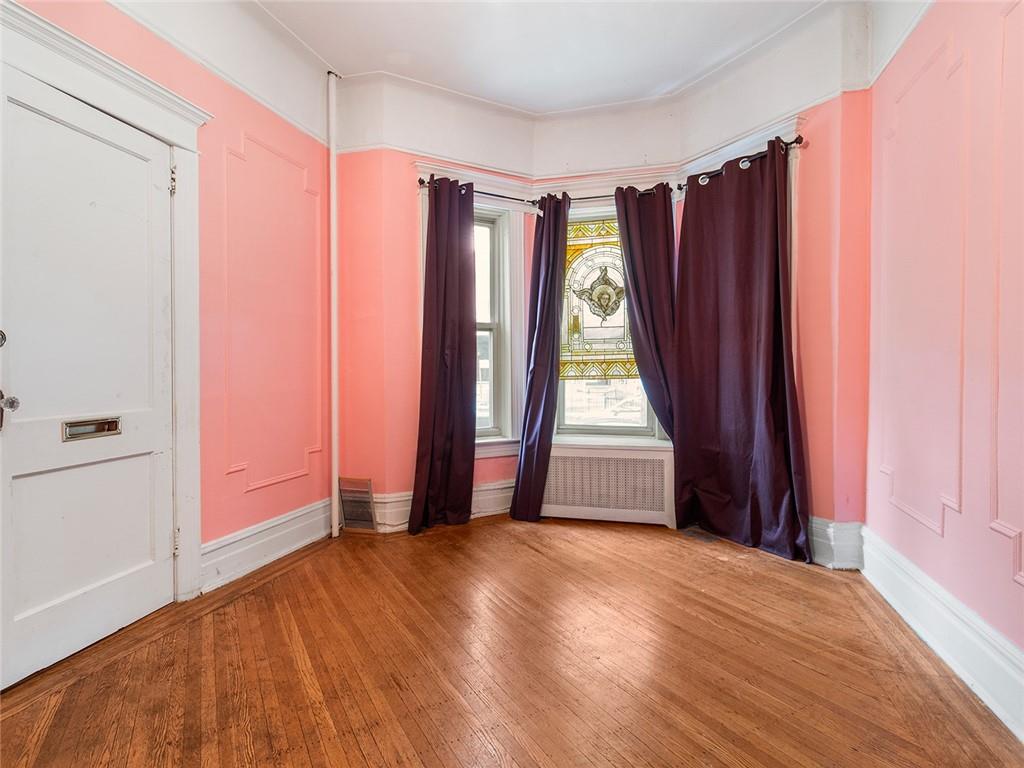 446 76th Street Brooklyn, NY 11209 - Photo 4 of 35 wooden floor and windows in a room