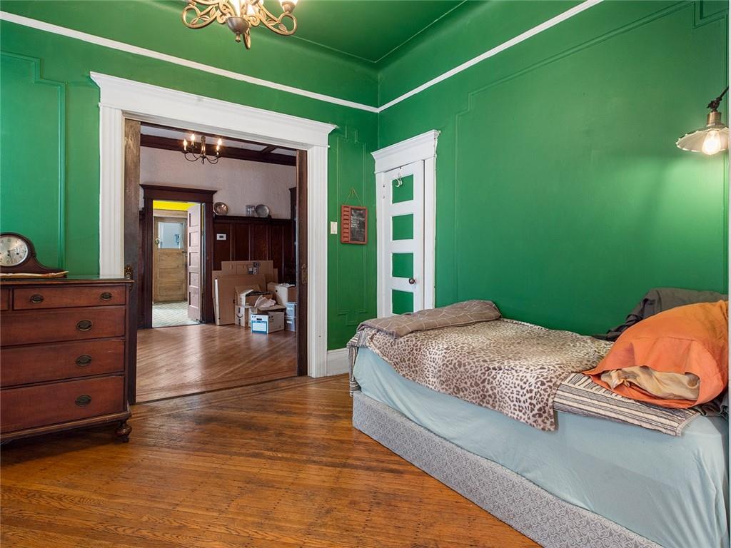 446 76th Street Brooklyn, NY 11209 - Photo 6 of 35 a bedroom with a bed and a dresser