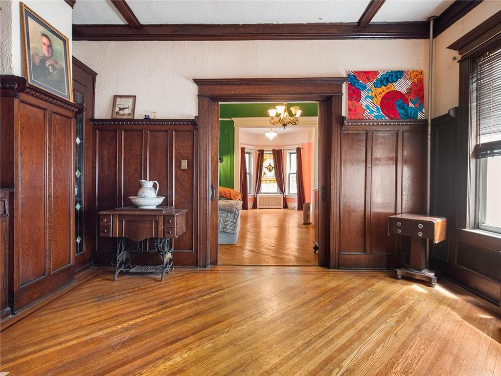 446 76th Street Brooklyn, NY 11209 - Photo 9 of 35 a view of an entryway with wooden floor