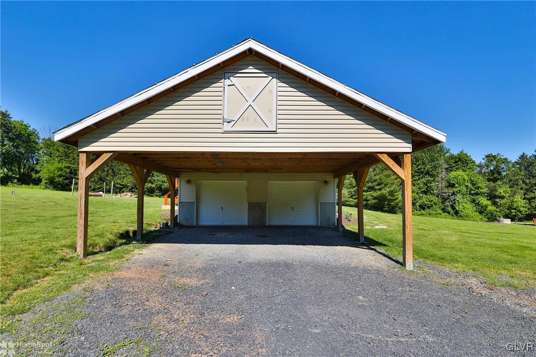 1095 Hideaway Hill Road Kunkletown, PA 18058 - Photo 4 of 49 a front view of a house with porch