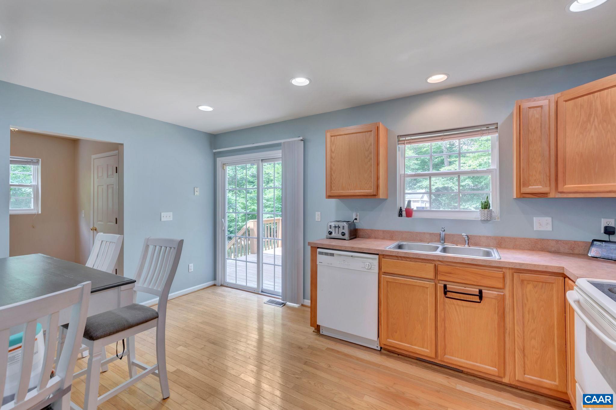 2 Riverside Drive Palmyra, VA 22963 - Photo 11 of 36 a kitchen with a sink cabinets and wooden floor