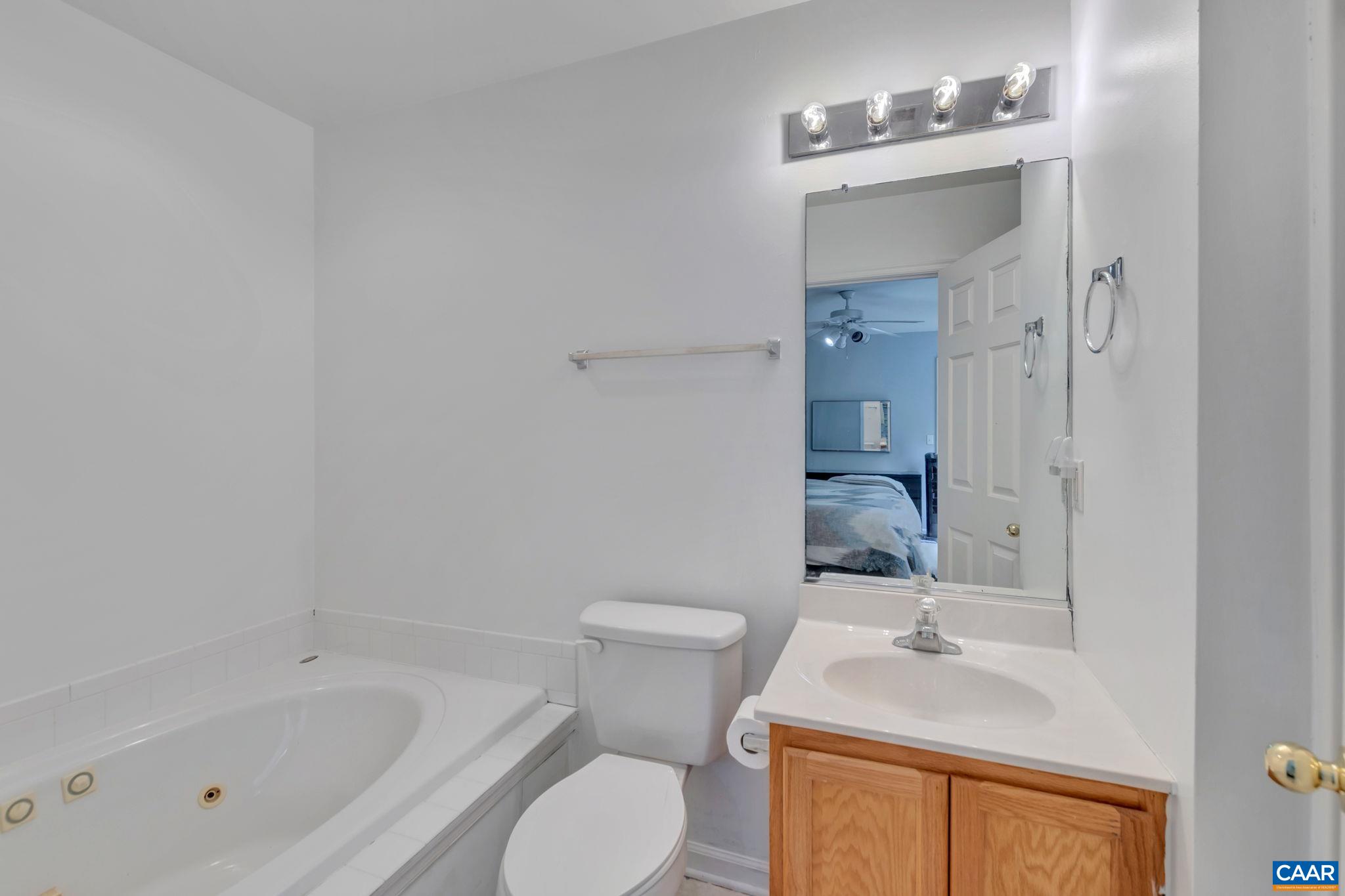 2 Riverside Drive Palmyra, VA 22963 - Photo 16 of 36 a bathroom with a sink toilet and shower